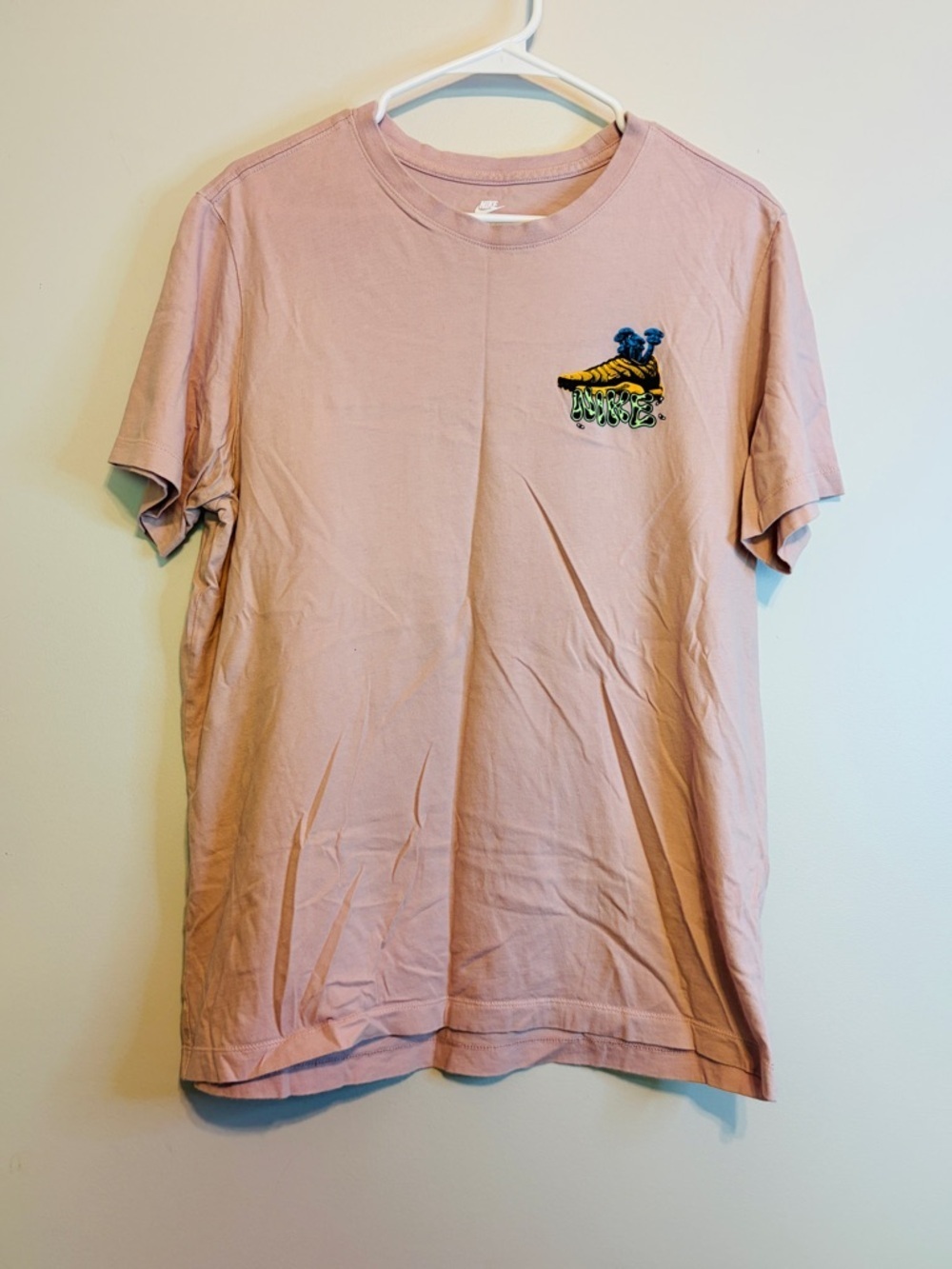 Nike Light Pink Short Sleeve Tee with Small Chest Graphic